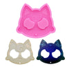 Pink silicone mold shaped like a cat head for DIY keychains and craft projects