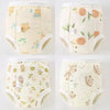 A set of four reusable cotton potty training pants for toddlers in light yellow with a subtle floral pattern.