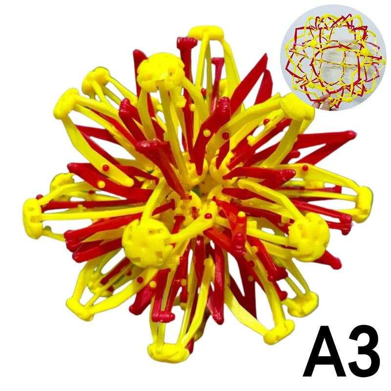 A colorful, expandable magic ball toy with red and yellow components used for stress relief and breathing exercises.