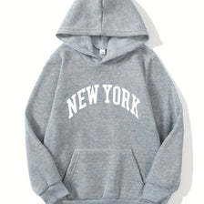 A gray pullover hoodie with the words NEW YORK printed in white across the chest.