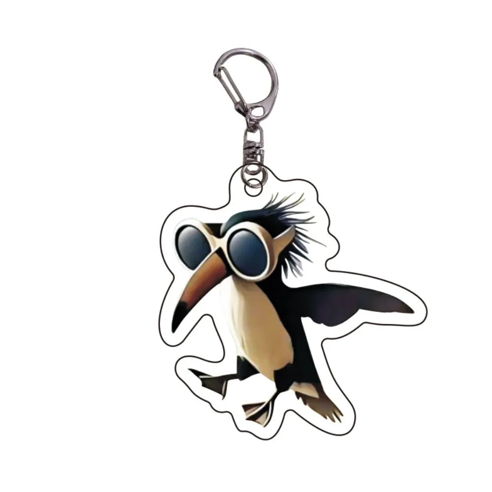 Acrylic keychain featuring a cartoon bird design with sunglasses and a speech bubble.