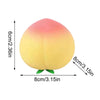 A light pink peach-shaped squeeze toy used for stress relief, shown with dimensions.