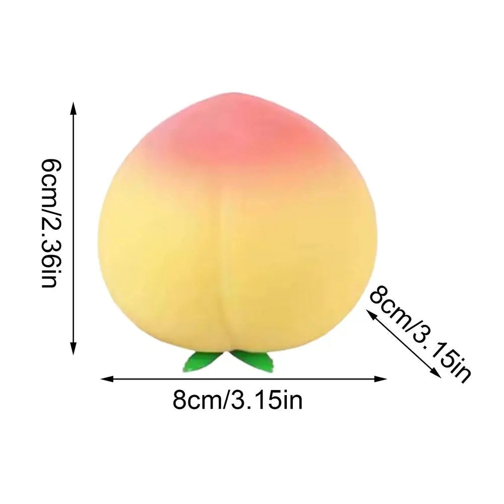 A light pink peach-shaped squeeze toy used for stress relief, shown with dimensions.