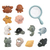 A collection of various silicone bath toys shaped like sea creatures including turtles, seals, and other marine animals.