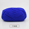 A ball of bright blue pre-dyed milk cotton yarn for knitting and crochet.