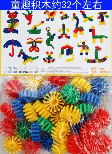 A collection of colorful plastic snowflake building blocks in various shapes and colors.