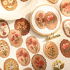 A collection of vintage floral stickers in earthy tones and muted colors for scrapbooking and journaling.