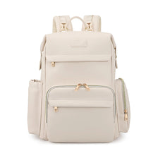 A beige minimalist diaper backpack with padded straps and multiple zippered pockets.