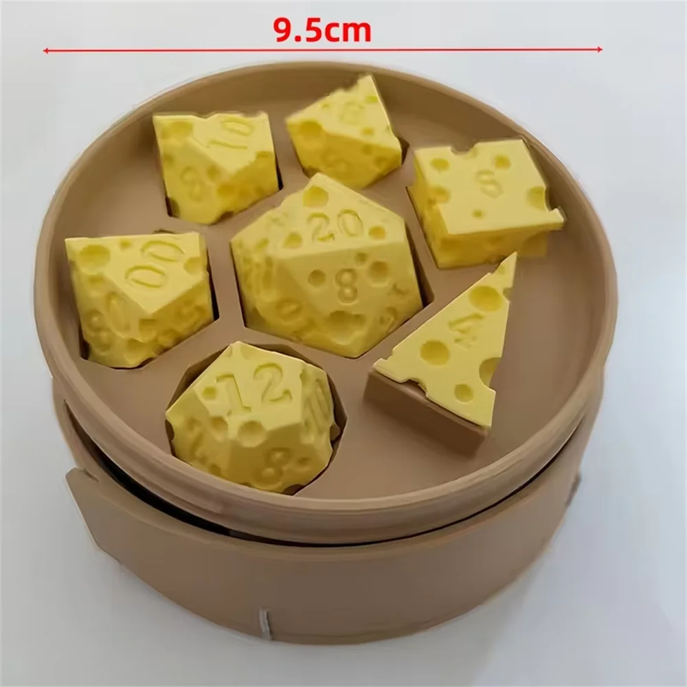 A set of yellow cheese dice cubes with numbers inside, displayed in a brown carrying case.