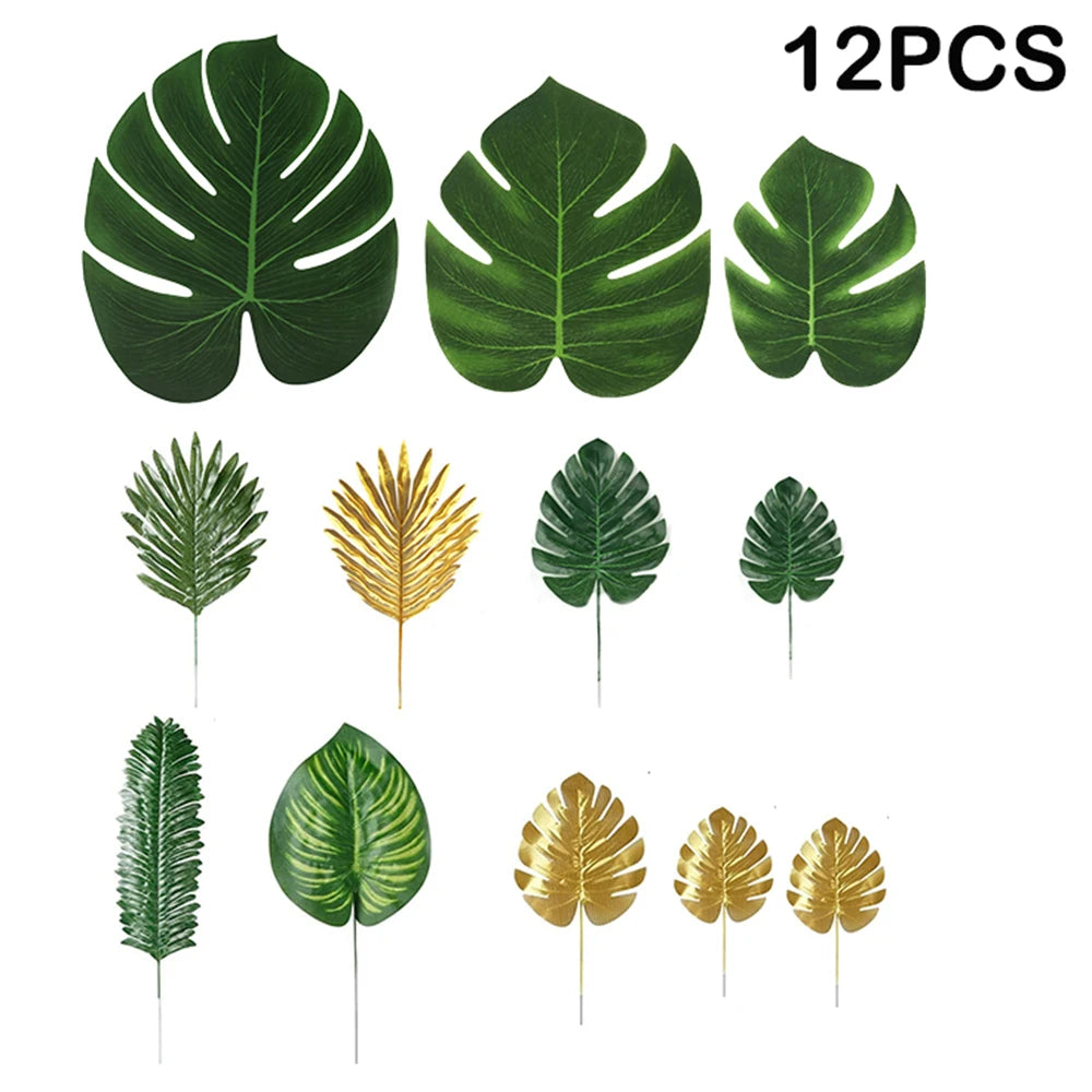 Twelve artificial tropical palm leaves in various shades of green and gold for party decor