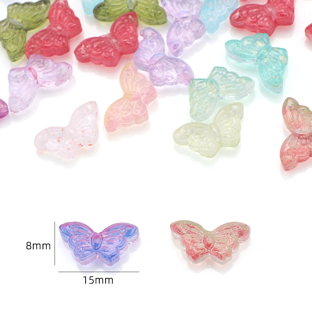A collection of colorful glass butterfly beads in various shades and sizes for jewelry making.