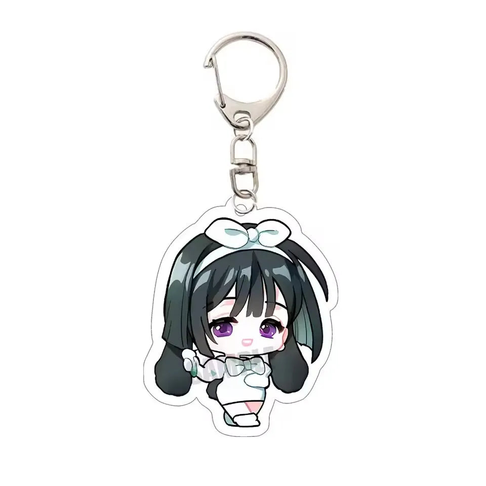 Acrylic keychain featuring an anime character with black hair and a white bow