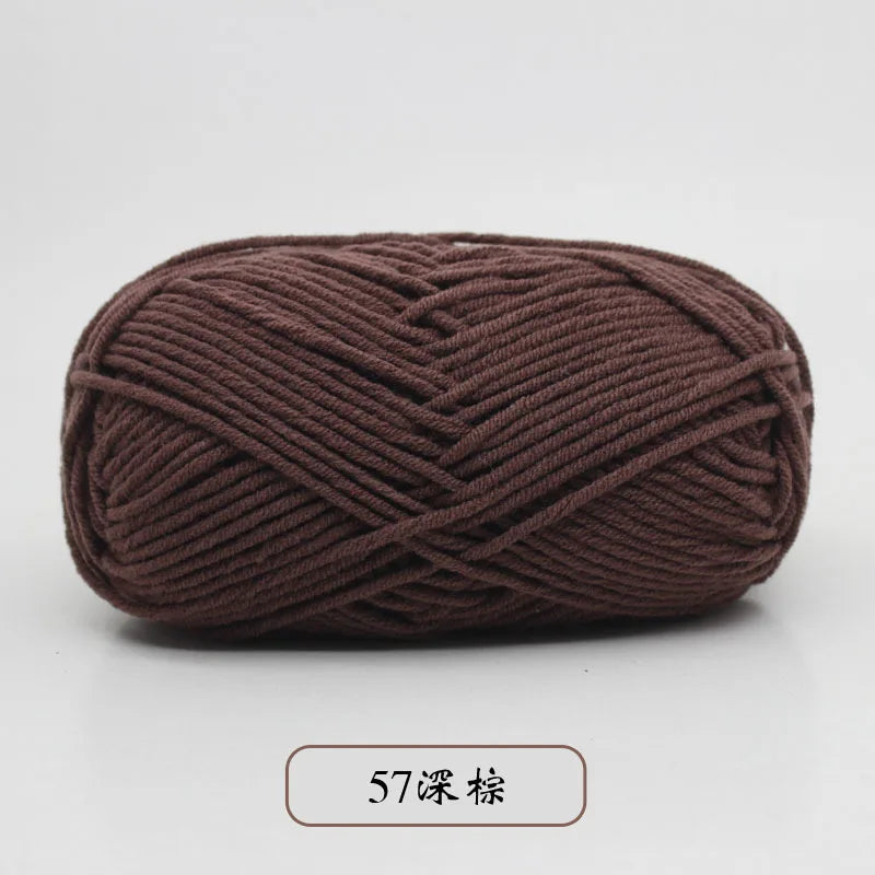 A ball of dark brown pre-dyed milk cotton yarn, 5-ply blended, used for knitting and crochet.