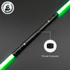 A black lightsaber staff with a green blade and a pre-set connector is shown diagonally on a dark surface.