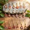 A collection of six metal keychains featuring character pendants from Stranger Things, including various figures and symbols.