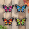 A set of four decorative iron butterfly wall art pieces featuring vibrant colors like pink, blue, and green.