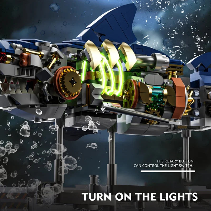 A mechanical shark building block set model with glowing lights is shown against a dark, watery background.