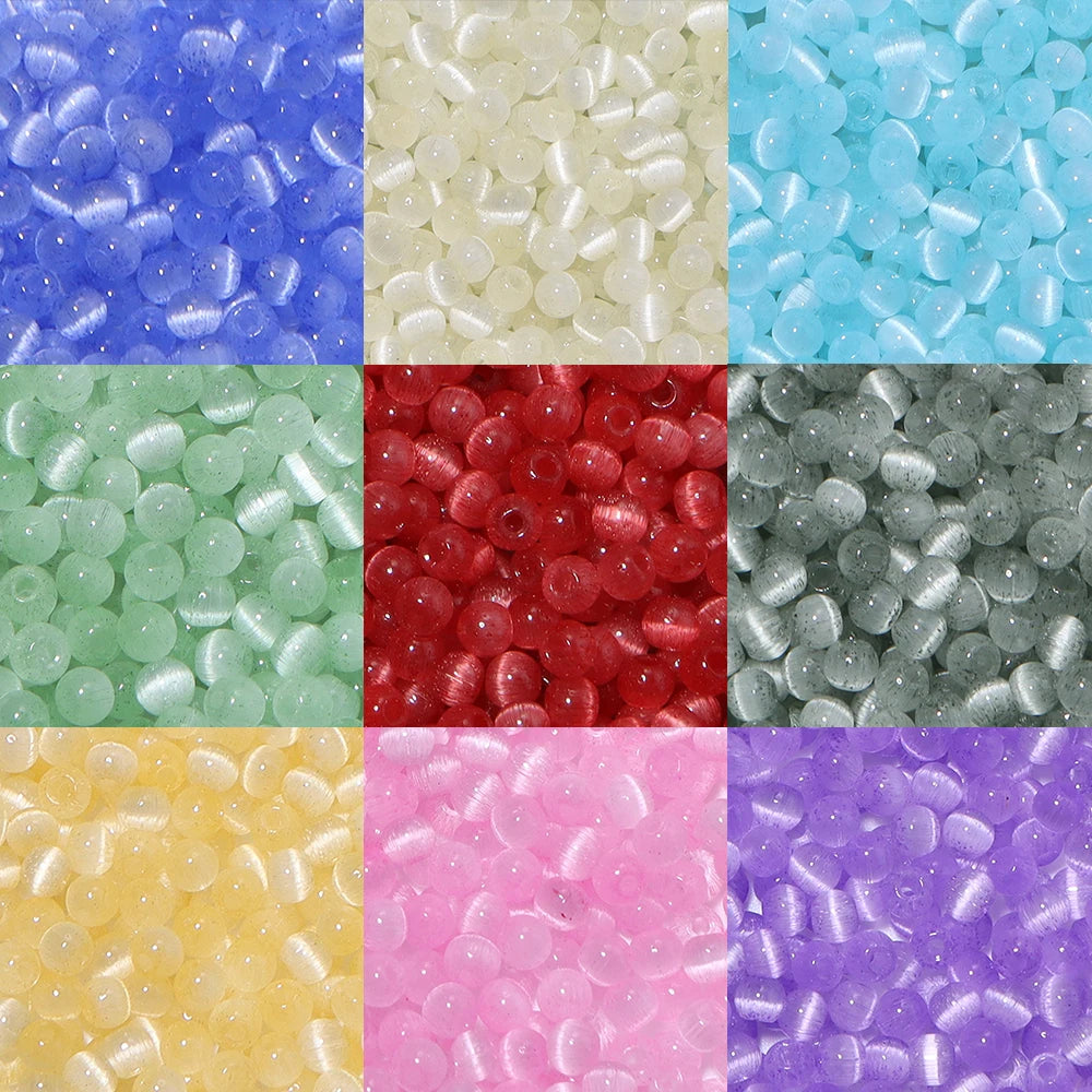 A grid of colorful glass beads in various shades including blue, yellow, green, red, and purple.