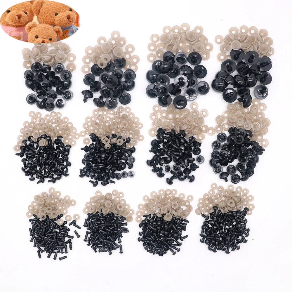 A collection of black plastic safety eyes with washers for crafting and stuffed animals