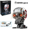 A mechanical skeleton head building kit with LED lights shown next to its disassembled components and assembled form.