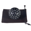 A black storage bag holds a 100-sided polyhedral die with numbered faces.