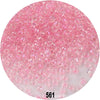 A microscopic view of pink glass seed beads used for jewelry making