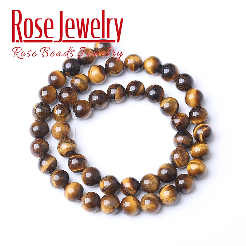 A strand of natural yellow tiger eye stone beads used for jewelry making