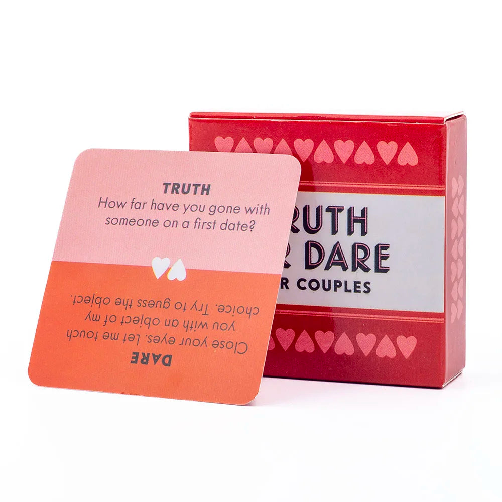 A red box and a pink card game featuring Truth or Dare prompts for couples.
