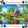A wooden puzzle depicting a scenic Dutch village with a house, garden, and water reflection.
