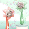 A pink and green sunflower bubble maker toy with a flower shape, featuring a large bubble blower mechanism.