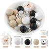 A collection of white and black cartoon animal silicone beads for DIY jewelry making, shown with various sizes and findings.