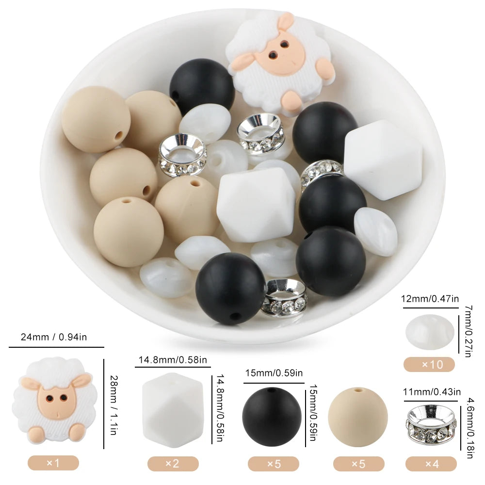A collection of white and black cartoon animal silicone beads for DIY jewelry making, shown with various sizes and findings.