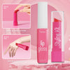 A pink lip gloss and styling kit with a red applicator shown next to a glass tube.
