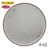 A circular display of 5mm clear beads, packaged for a craft kit.