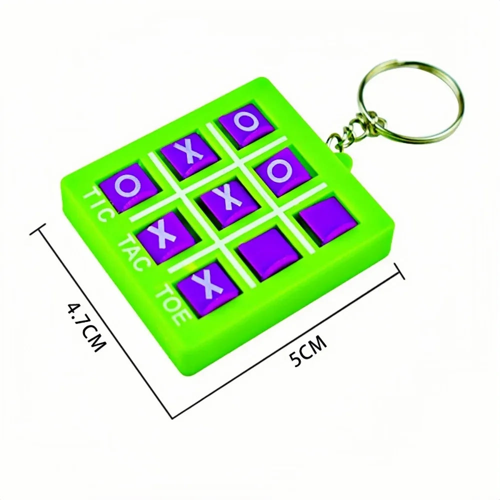 A bright green mini Tic Tac Toe puzzle game with purple tiles and a metal keyring.
