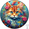 A colorful jigsaw puzzle depicting a fluffy orange and white kitten's face.