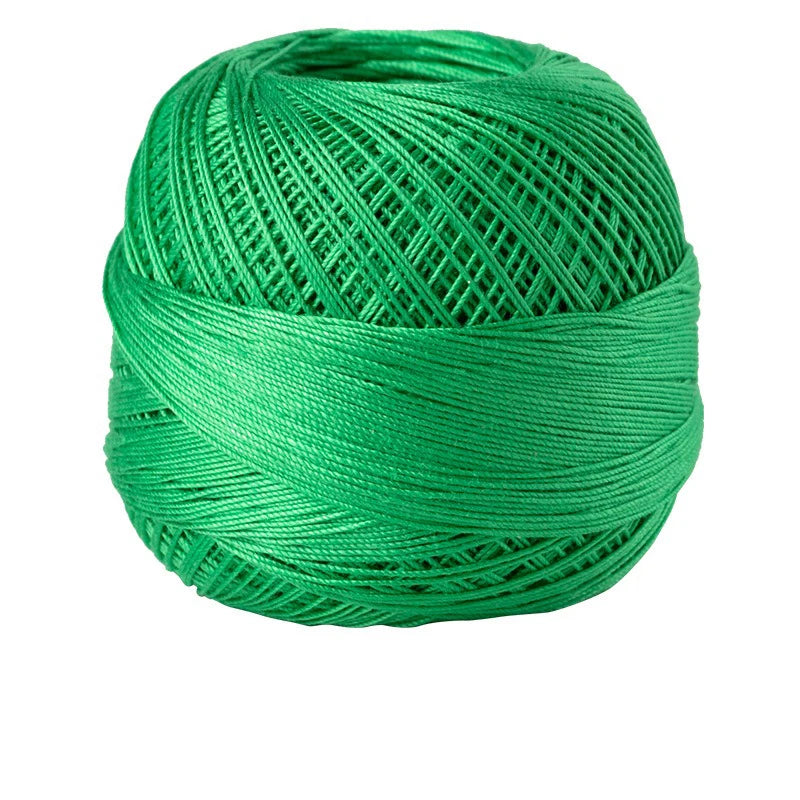 A spool of bright green 100% cotton crochet thread for tatting and embroidery.