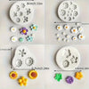 A collection of reusable silicone petal molds in various shapes and colors for crafting.