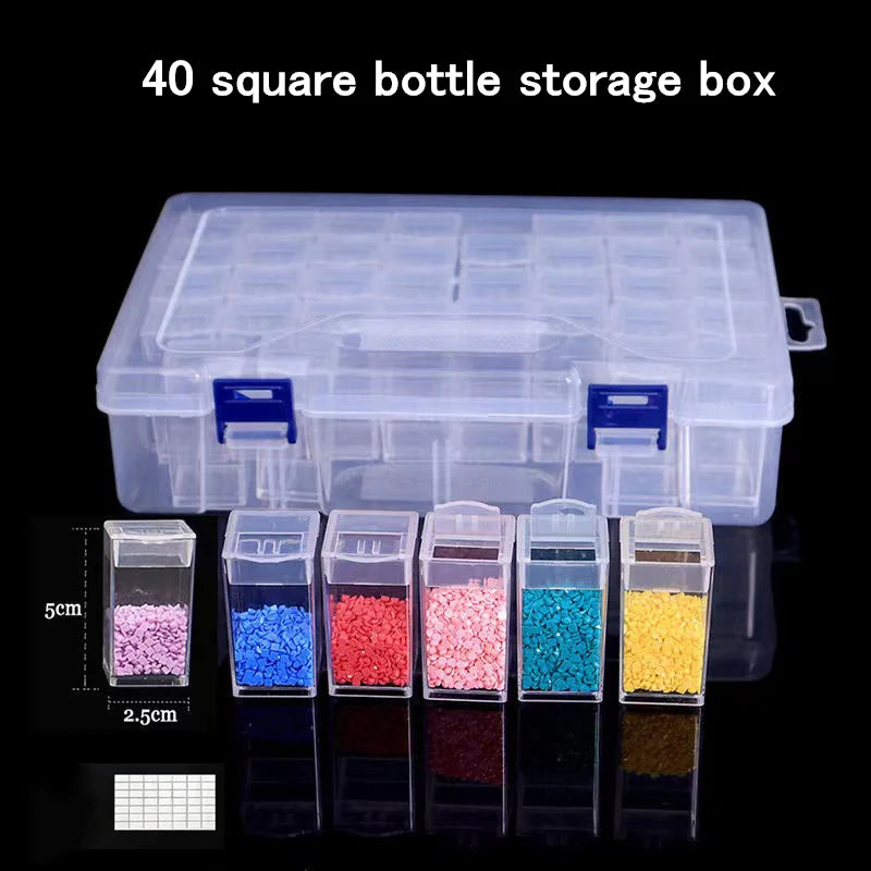 A transparent storage box with multiple compartments filled with colored beads and materials.