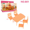 An orange 1:12 scale dollhouse furniture set featuring a dining table and chairs.