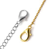 A pair of metal lobster clasps, one silver and one gold, used for jewelry making.