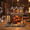 A miniature kit of a wooden magic store cottage featuring detailed furniture and architecture.
