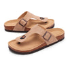 Tan suede cork mules with leather straps and arch support shown from above