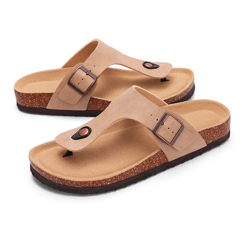 Tan suede cork mules with leather straps and arch support shown from above