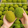 A hand holds a green durian handmade ball with a spiky texture, demonstrating its clear and loud sound.