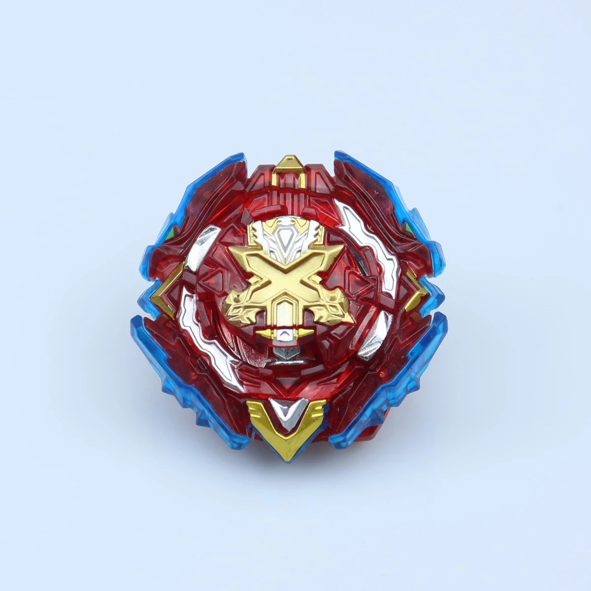 A magnetic spinning top featuring red, blue, and silver components with a gold emblem.