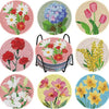 A set of floral diamond painting coasters with metal holders featuring various colorful flower designs.