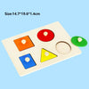 A wooden Montessori shape and color sorter puzzle with various colored discs and shapes for toddlers.