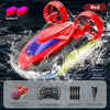 Un bateau RC électrique amphibie rouge et violet qui éclabousse l'eau.