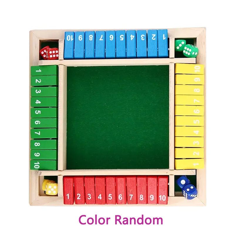 A wooden game board with colored dice and numbered slots for a four-player dice game